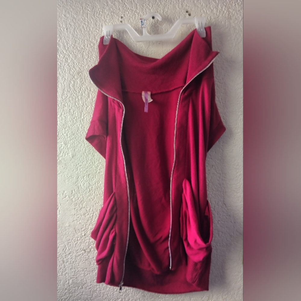Red zip up top